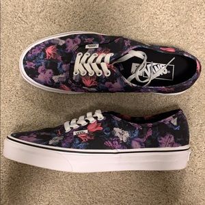 Vans, men’s 8.5, women’s 10. Never worn.